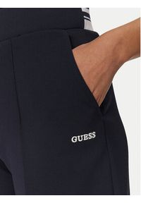 Guess Spódnica 172915 Niebieski Classic Fit. Kolor: niebieski. Materiał: syntetyk