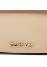 Calvin Klein Saszetka Ck Origami Camera Bag K50K511900 Beżowy. Kolor: beżowy. Materiał: materiał #6