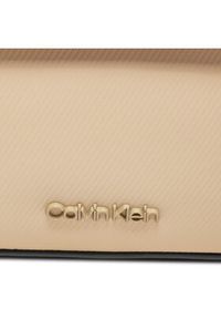 Calvin Klein Saszetka Ck Origami Camera Bag K50K511900 Beżowy. Kolor: beżowy. Materiał: materiał #4