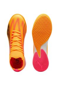 Buty piłkarskie Puma Ultra Match It M 107758 03 pomarańczowe. Kolor: pomarańczowy. Materiał: guma. Sport: piłka nożna