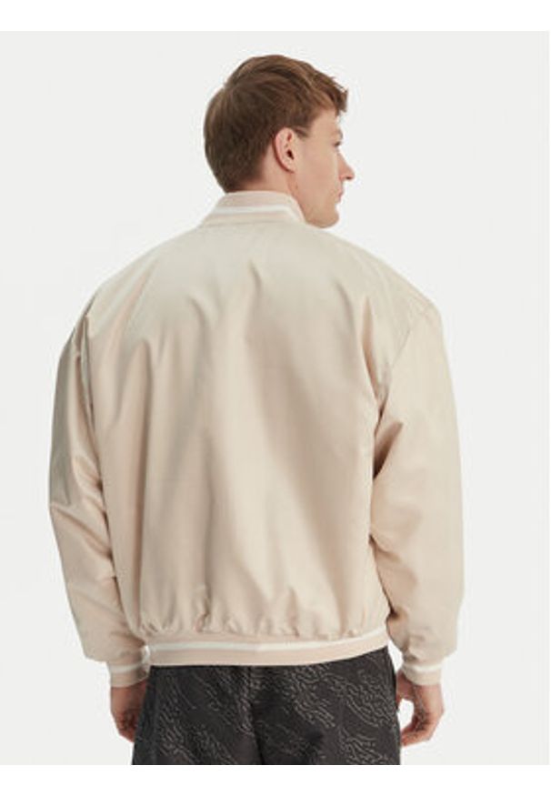 Adidas - adidas Kurtka bomber Stadium KE6211 Beżowy Loose Fit. Kolor: beżowy. Materiał: syntetyk