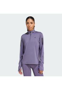 Adidas - Kurtka Own the Run Half-Zip. Kolor: fioletowy. Materiał: materiał. Sport: bieganie