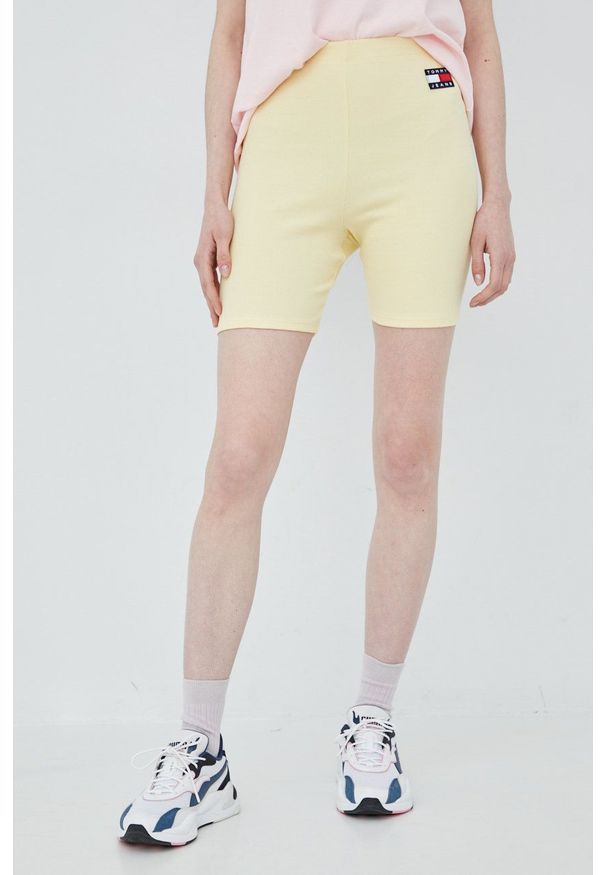 Tommy Jeans szorty DW0DW14174.PPYY damskie kolor żółty gładkie high waist. Stan: podwyższony. Kolor: żółty. Materiał: bawełna, dzianina. Wzór: gładki