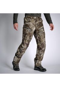 SOLOGNAC - Spodnie myśliwskie Solognac Warm 900 camo treemetic wodoodporne. Kolor: zielony, wielokolorowy, brązowy. Materiał: polar, materiał, skóra, tkanina
