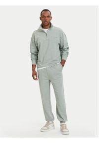 TOMMY HILFIGER - Tommy Hilfiger Bluza Essential UM0UM03909 Zielony jasny Regular Fit. Kolor: zielony. Materiał: bawełna #3