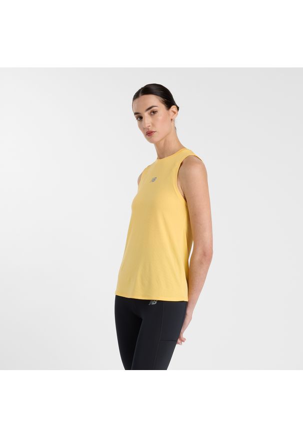 Koszulka damska New Balance WT51252CEE – żółta. Kolor: żółty. Materiał: poliester, tkanina, materiał