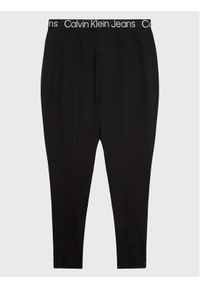 Calvin Klein Jeans Legginsy J20J220835 Czarny Slim Fit. Kolor: czarny. Materiał: wiskoza