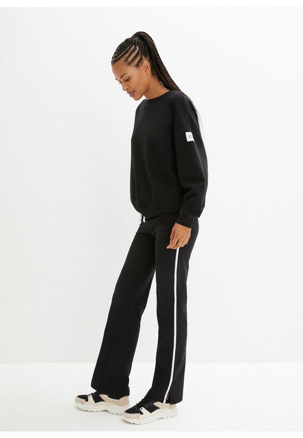 bonprix - Spodnie z bawełnianego dżerseju ze stretchem. Kolor: czarny. Materiał: jersey, bawełna. Styl: sportowy