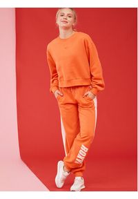 Roxy Spodnie dresowe Ess Nrj Cbk Jog Otlr ERJFB03366 Pomarańczowy Regular Fit. Kolor: pomarańczowy. Materiał: bawełna. Sport: joga i pilates #3