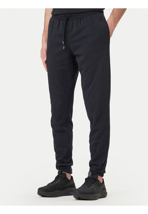 Under Armour Spodnie dresowe UA Rival 6014638 Czarny Regular Fit. Kolor: czarny. Materiał: bawełna