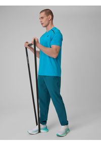 4f - 4F Spodnie treningowe szybkoschnące męskie - granatowe S. Kolor: niebieski. Materiał: skóra. Sport: fitness #1