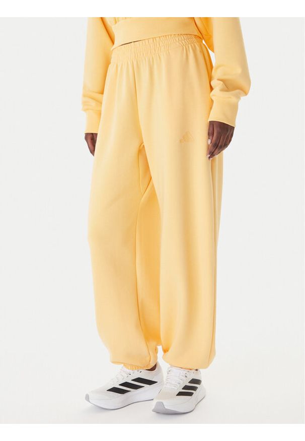 Adidas - adidas Spodnie dresowe Soft Lux KA7020 Pomarańczowy Loose Fit. Kolor: pomarańczowy. Materiał: syntetyk