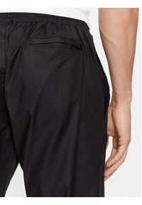 Reebok Spodnie dresowe Essentials II0695 Czarny Regular Fit. Kolor: czarny. Materiał: bawełna #2