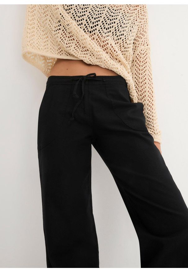 bonprix - Spodnie lniane z szerokimi nogawkami. Kolor: czarny. Materiał: len