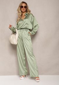 Renee - Zielone Szerokie Spodnie z Gumką w Talii i Błyszczącym Wzorem w Paski Zoyama. Kolor: zielony. Wzór: paski