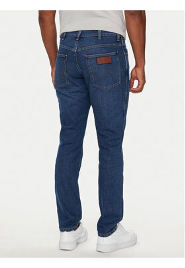 Wrangler Jeansy River 112356835 Niebieski Tapered Fit. Kolor: niebieski