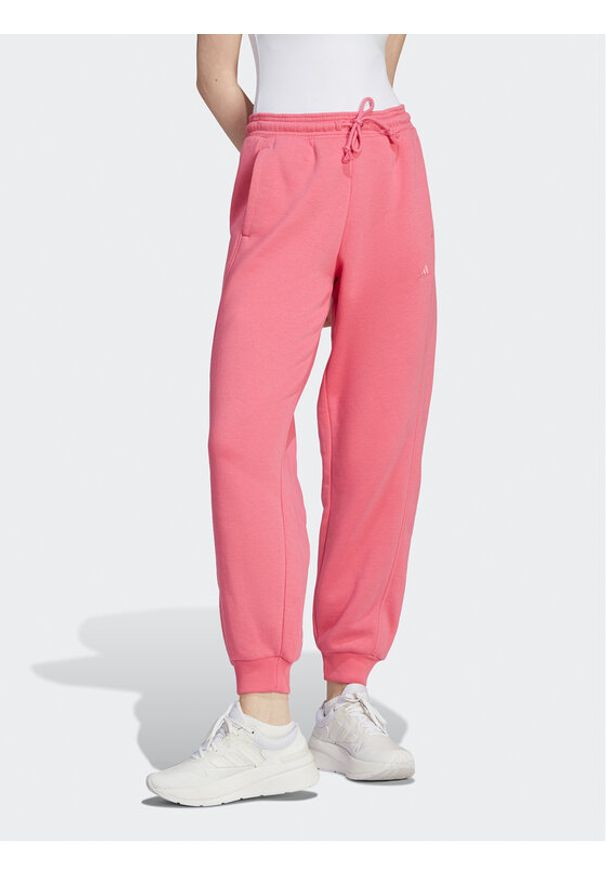 Adidas - adidas Spodnie dresowe ALL SZN Fleece IM0334 Różowy Loose Fit. Kolor: różowy. Materiał: bawełna