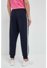 Adidas - adidas spodnie dresowe bawełniane kolor granatowy wzorzyste. Kolor: niebieski. Materiał: bawełna, dresówka #4