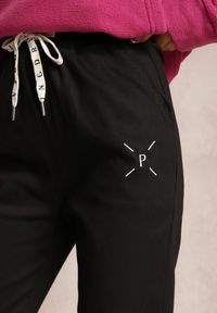 Renee - Czarne Bawełniane Spodnie Dresowe Arnhilla. Kolor: czarny. Materiał: bawełna, dresówka. Wzór: haft