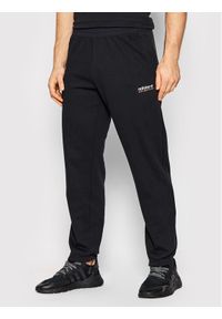 Adidas - adidas Spodnie dresowe Adventure HF4771 Czarny Regular Fit. Kolor: czarny. Materiał: bawełna, dresówka #1