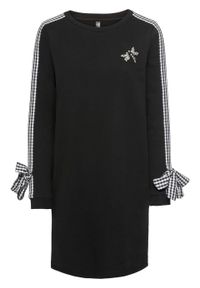Sukienka dresowa z kokardkami i aplikacją bonprix czarny. Typ kołnierza: kokarda. Kolor: czarny. Materiał: dresówka. Wzór: aplikacja #1
