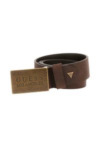 Guess - GUESS Brązowy męski pasek z naturalnej skóry Algarve. Kolor: brązowy. Materiał: skóra