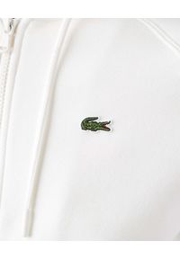 Lacoste - LACOSTE - Biała bluza z haftowanym logo. Kolor: biały. Materiał: prążkowany. Wzór: haft #5