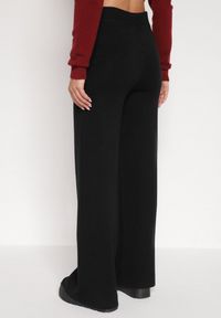 Born2be - Czarne Dzianinowe Spodnie o Szerokim Kroju ze Sznurkami Melatusa. Okazja: na co dzień. Stan: podwyższony. Kolor: czarny. Materiał: dzianina. Styl: klasyczny, casual, elegancki #4