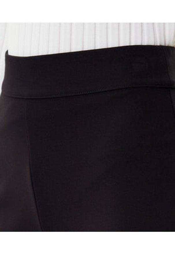 DKNY Spodnie materiałowe P2JKTO68 Czarny Flare Fit. Kolor: czarny. Materiał: wiskoza