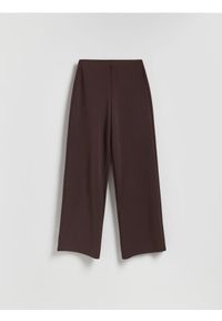 Reserved - Spodnie z szerokimi nogawkami - brązowy. Kolor: brązowy. Materiał: tkanina. Wzór: gładki