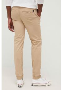 Tom Tailor spodnie męskie kolor beżowy joggery. Kolor: beżowy. Materiał: bawełna
