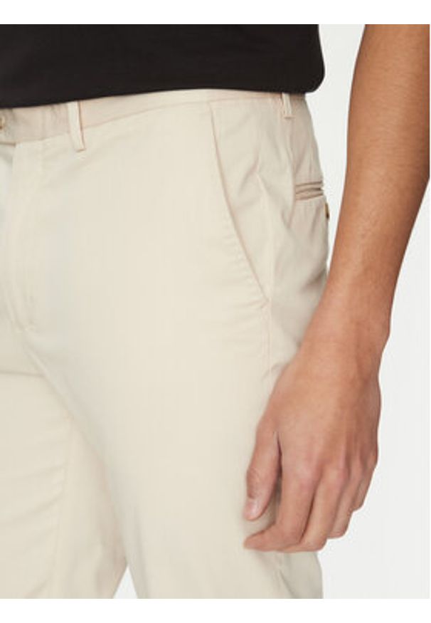 TOMMY HILFIGER - Tommy Hilfiger Chinosy Denton MW0MW38863 Beżowy Slim Fit. Kolor: beżowy. Materiał: bawełna