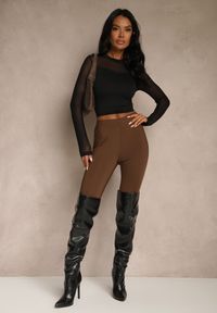 Renee - Czarna Bluzka Golf Vices z Przezroczystymi Rękawami Kariale. Okazja: na co dzień. Typ kołnierza: golf. Kolor: czarny. Materiał: jeans. Styl: casual, elegancki