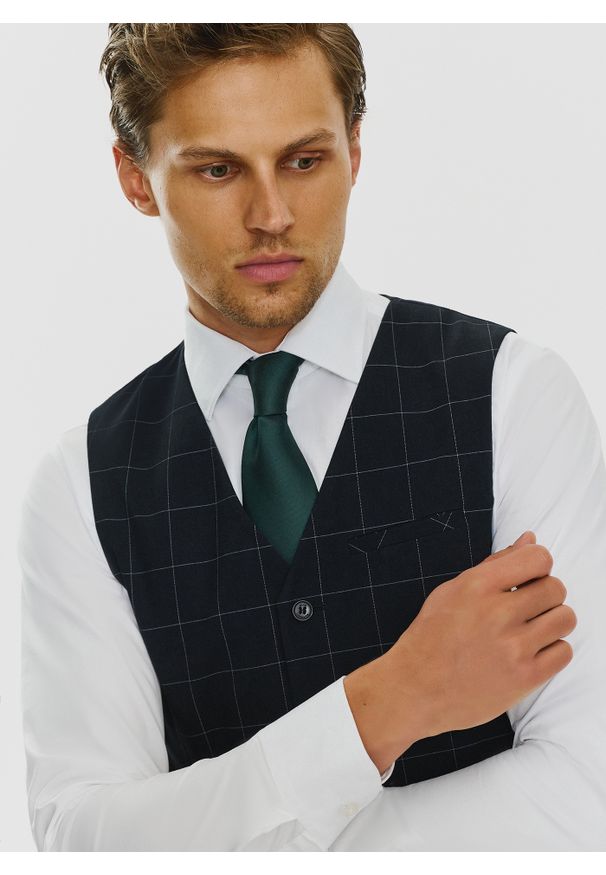 Pako Lorente - PAKO LORENTE – Granatowa kamizelka w kratę Windowpane. Kolor: niebieski. Materiał: poliester, wiskoza, elastan