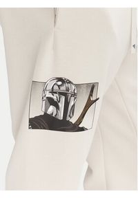 Adidas - adidas Spodnie dresowe Star Wars The Mandalorian™ JI5723 Beżowy Regular Fit. Kolor: beżowy. Materiał: syntetyk. Wzór: motyw z bajki #3