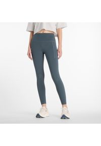 Legginsy damskie New Balance WP51268GT – szare. Stan: podwyższony. Kolor: szary. Materiał: poliester, materiał, lycra. Wzór: gładki. Sport: fitness