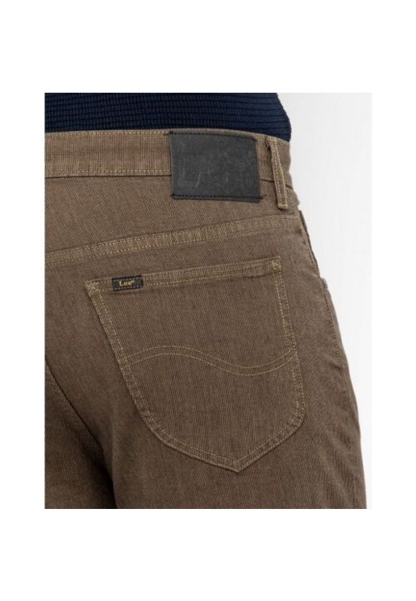 Lee - LEE RIDER MĘSKIE SPODNIE MATERIAŁOWE IVY GREEN L701LL06 112117579. Materiał: materiał
