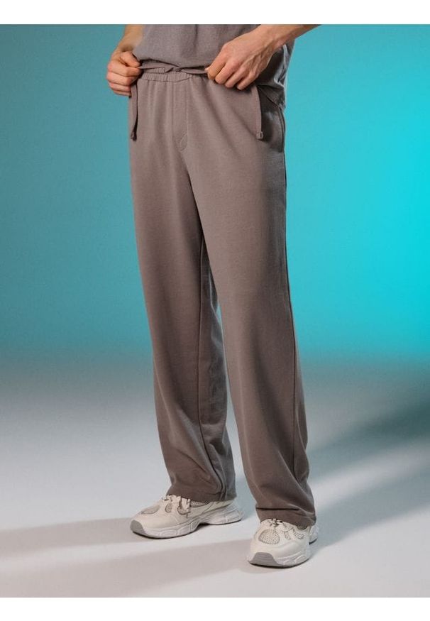 Sinsay - Spodnie dresowe wide leg - szary. Kolor: szary. Materiał: dresówka