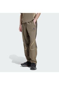 Adidas - adidas Spodnie dresowe adicolor Teamgeist KD5865 Khaki Loose Fit. Kolor: brązowy. Materiał: syntetyk #1