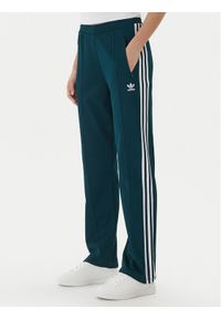 Adidas - adidas Spodnie dresowe Beckenbauer JV7395 Zielony Regular Fit. Kolor: zielony. Materiał: bawełna
