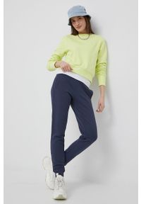 adidas Originals spodnie dresowe damskie kolor fioletowy gładkie. Kolor: fioletowy. Materiał: dresówka. Wzór: gładki