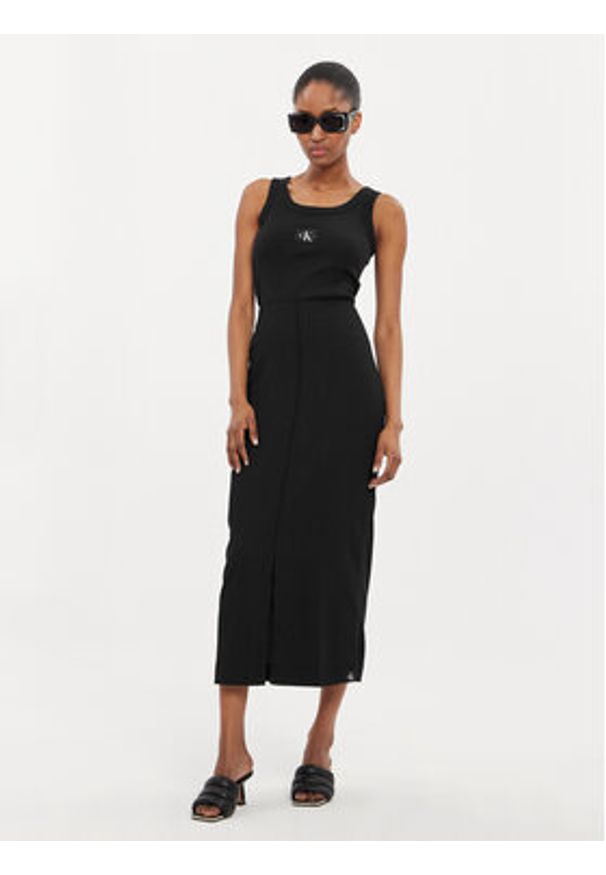 Calvin Klein Jeans Spódnica midi J20J223144 Czarny Regular Fit. Kolor: czarny. Materiał: syntetyk
