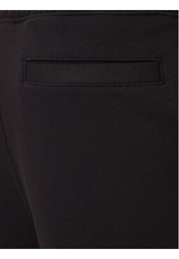 Hugo - HUGO Spodnie dresowe Nyrotro 50549779 Czarny Loose Fit. Kolor: czarny. Materiał: bawełna