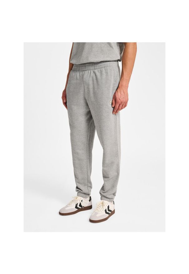 Spodnie do biegania Hummel Pulse. Kolor: szary. Materiał: dresówka. Sport: fitness