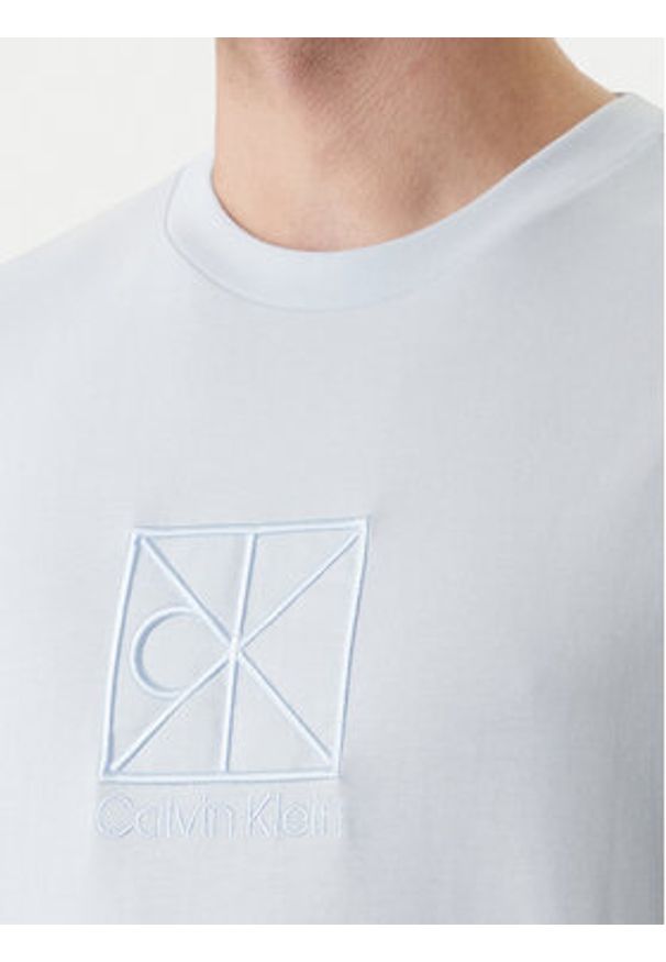 Calvin Klein T-Shirt Emblem Graphic LV14RF817G Błękitny Regular Fit. Kolor: niebieski. Materiał: bawełna