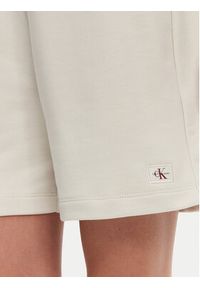 Calvin Klein Jeans Szorty sportowe J20J225221 Beżowy Relaxed Fit. Kolor: beżowy. Materiał: bawełna #5
