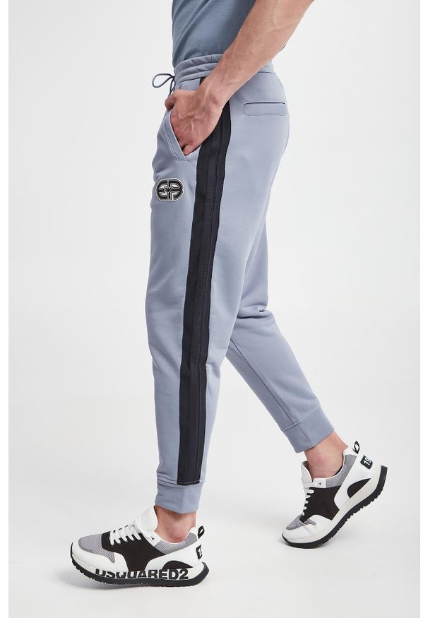 Emporio Armani - Spodnie dresowe męskie EMPORIO ARMANI. Materiał: dresówka