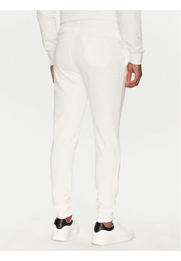 Guess Spodnie dresowe Z2YB22 KAIJ1 Biały Regular Fit. Kolor: biały. Materiał: bawełna