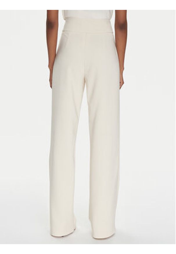 Rinascimento Spodnie materiałowe CFC0122883003 Beżowy Regular Fit. Kolor: beżowy. Materiał: syntetyk