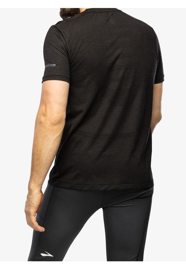 Koszulka biegowa męska Under Armour Seamless Stride SS. Kolor: czarny. Długość rękawa: długi rękaw. Długość: długie. Sport: fitness
